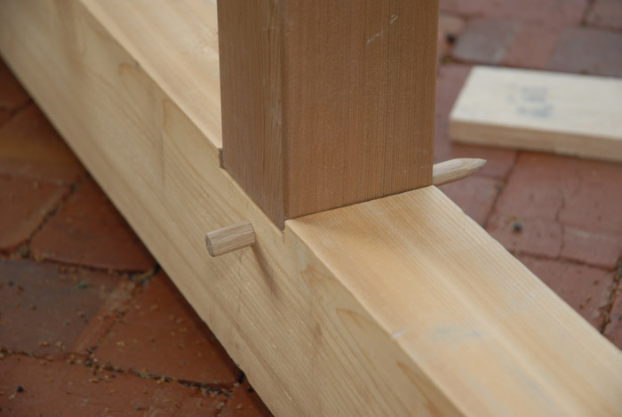 The finished peg joins a post and beam.