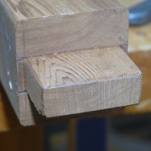 After defining the tenon shoulders with a handsaw, I cut the cheeks on the bandsaw, then tuned with rasp and chisel to fit. 